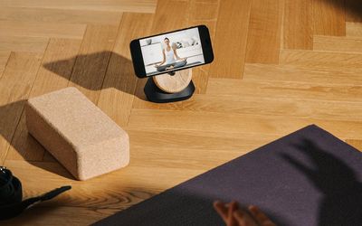 Close up on a person's hands during a floor exercise.